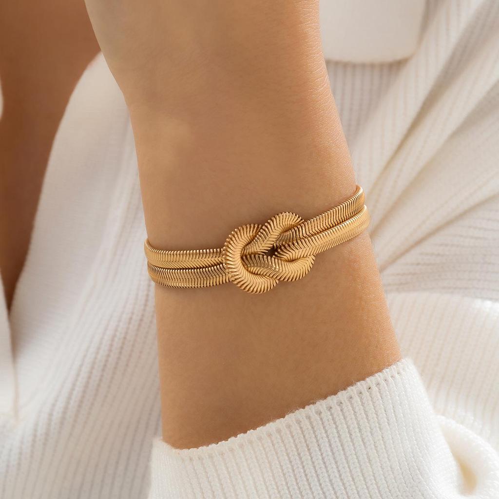 Wrap-around Snake Bone Chain Bracelet: European-American Minimalist Design with a Cold Style Knot and Buckle.