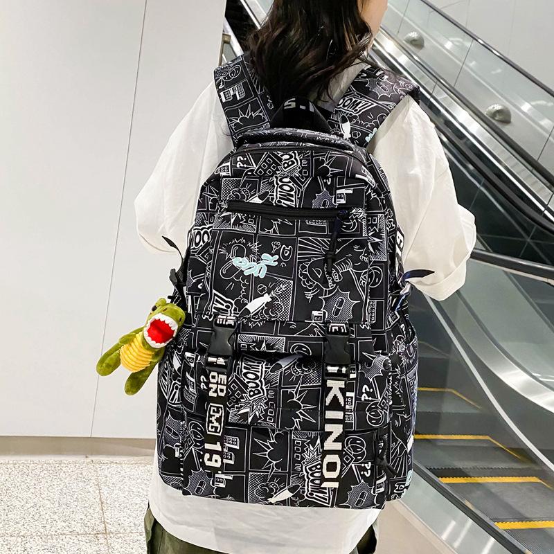 School bag male Korean version manga letters large capacity junior high school student campus backpack cool street couple backpack