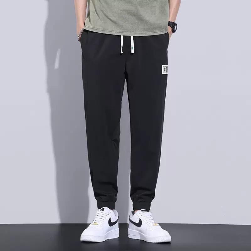 

Summer new casual pants men s thin ice silk tied feet loose and comfortable sweatpants M чёрный
