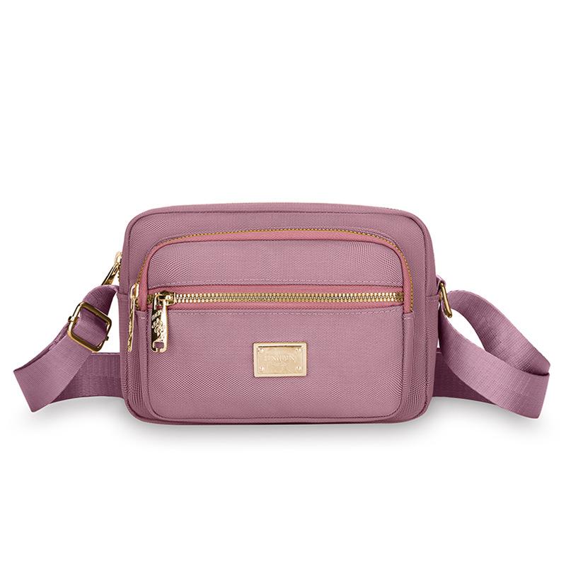 New Portable Oxford Cloth Mother Bag Fashion Simple Multi Layer Middle Aged Shoulder Bag Atmosphere Joker Slung Small Bag.