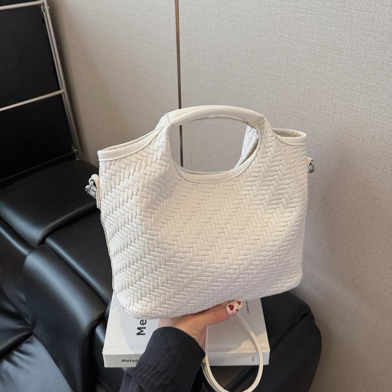 

Simple and high-end portable mother and child bag women s summer new large-capacity messenger bucket bag