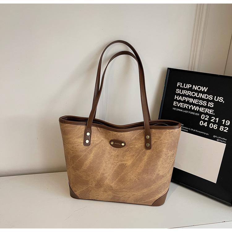 Large-capacity bag women's autumn and winter versatile 2025 new fashion casual shoulder bag texture class commuter bag