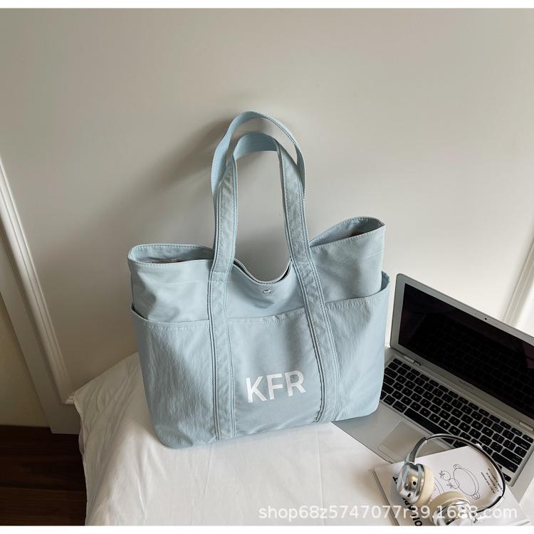 

Canvas bag women 2025 new large-capacity handbag college students commute advanced texture casual tote bag tide синий