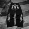 Dunkle Dornenschutzhose: Streetstyle-Jogginghose mit Kordelzug, geradem Bein und Fleece-Futter, perfekt für Workouts im Freien und zum Joggen