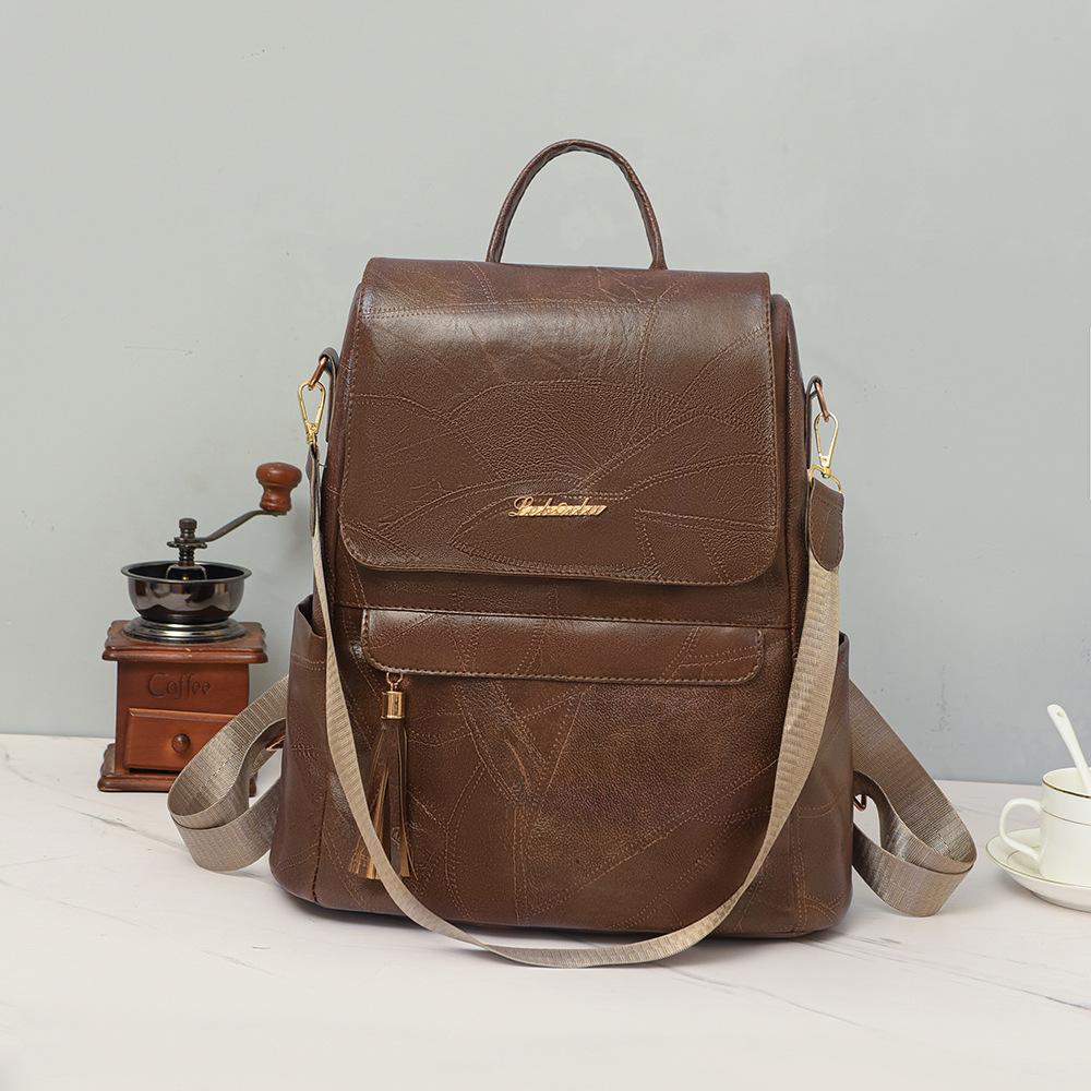 Женский многофункциональный рюкзак из мягкой кожи с кисточками в стиле ретро — фото 5