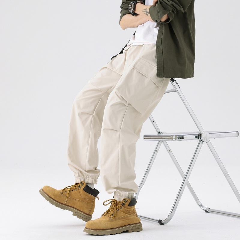 

Charge pants men s spring and autumn thickened outdoor mountaineering pants men s waterproof, windproof and cold-proof tooling pants 3XL