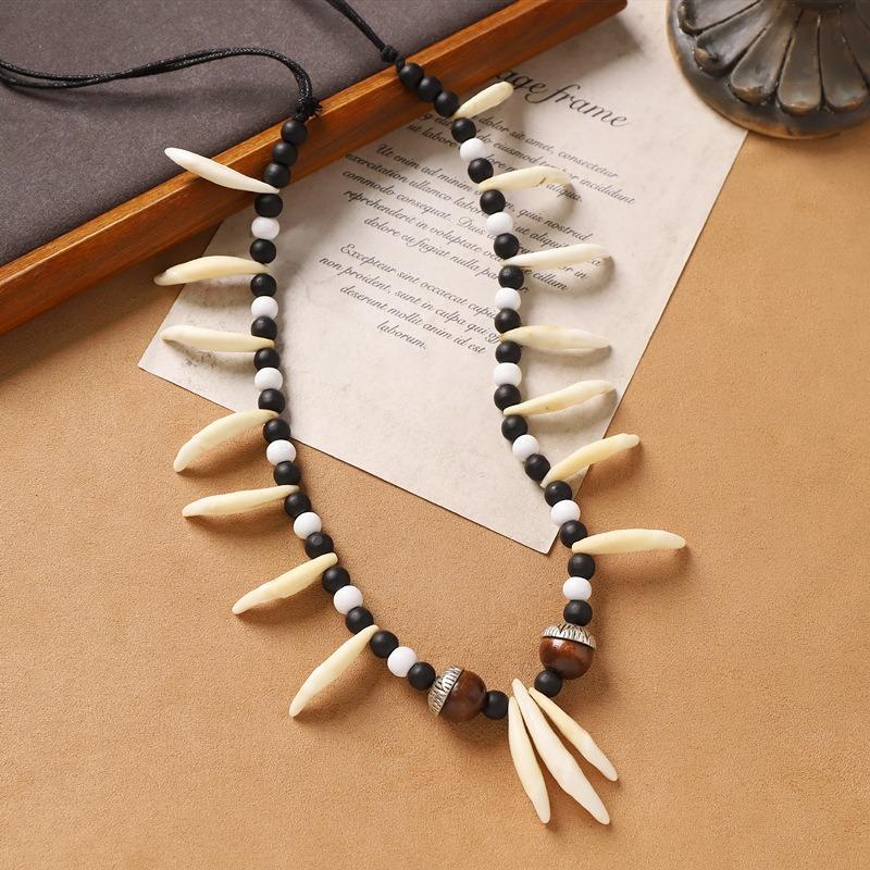 

Original long dog tooth necklace men s and women s retro personalized woven sweater chain exaggerated wolf tooth accessories