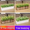Silk Flower Pot with Wood Fence: Decorative Bonsai for Living Room or Office.