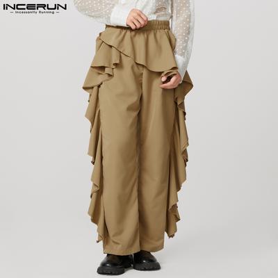 Pantalones de hombre con cintura elástica y volantes largos irregulares de color liso