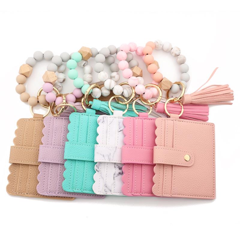 Leopard Print Silicone Bead Bracelet Wallet with PU Leather Tassel Keychain