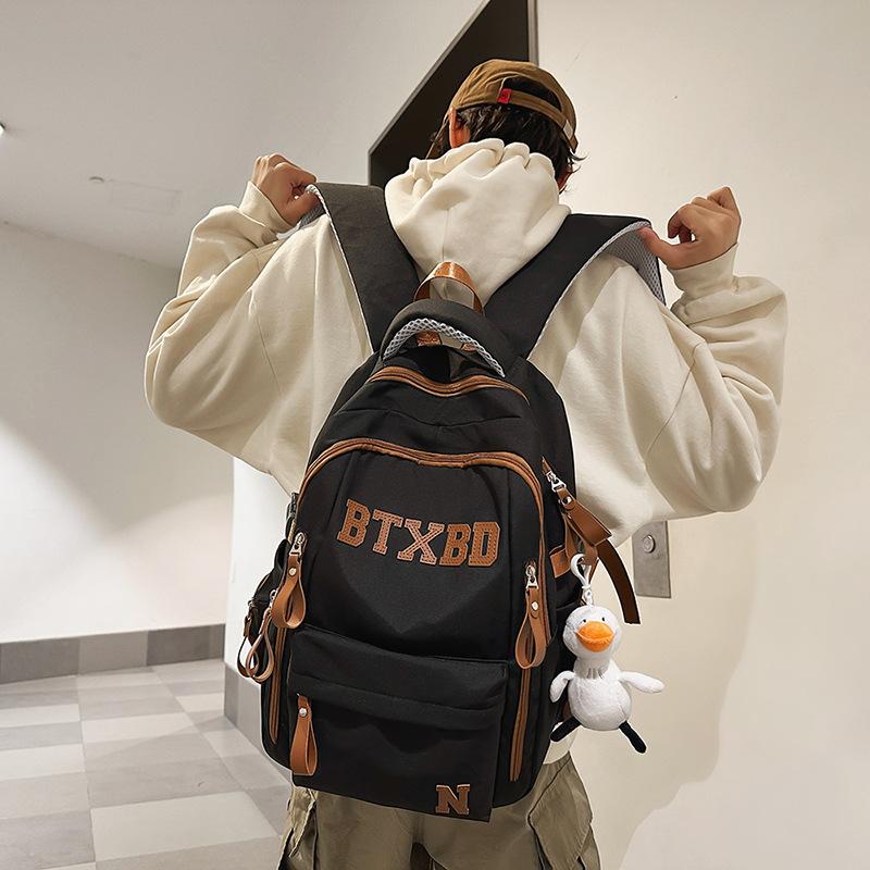 Large-capacity multi-layer schoolbag, junior high school students, girls, boys, high school students, load reduction ridge protection