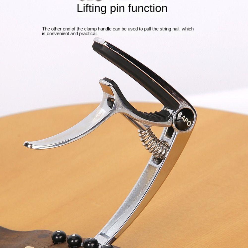 Gitarrenklang-Einstellungs-Schnellwechselklemme Schlüssel-Auslösekappe Kapodaster Gitarren-Kapodaster Gitarren-Stimmgerät Gitarrenklemme