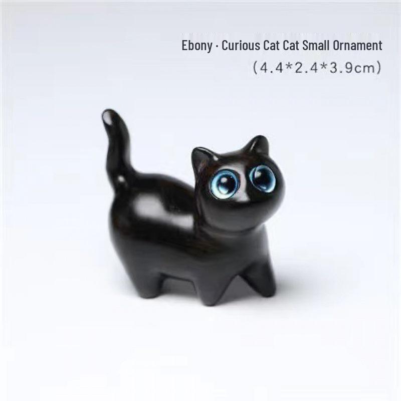 Curious Cat Ornament: Green Sandalwood with Intricate Black Carving 4.4*2.3*3.8 cm