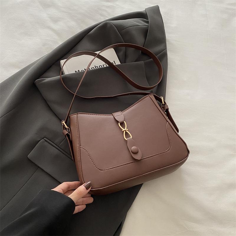 

Французская нишевая дизайнерская сумка 2025 новая трендовая модная сумка-подмышка высокая ценность зарубежная легкая роскошь портативная сумка-ведро