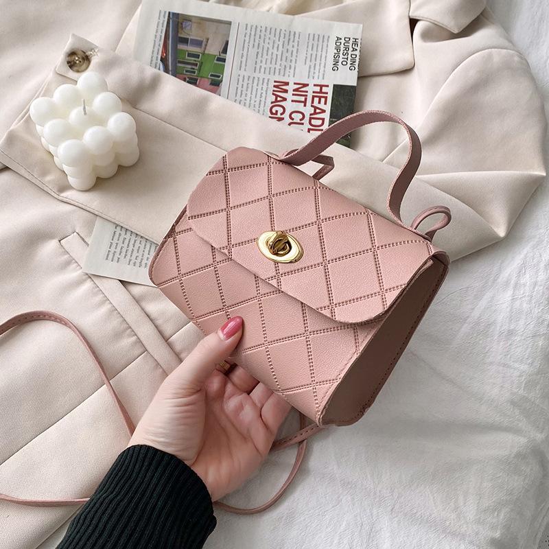 Rhombus fresh small square bag women's shoulder messenger bag women's bag round lock embossed new product spring and summer age reduction