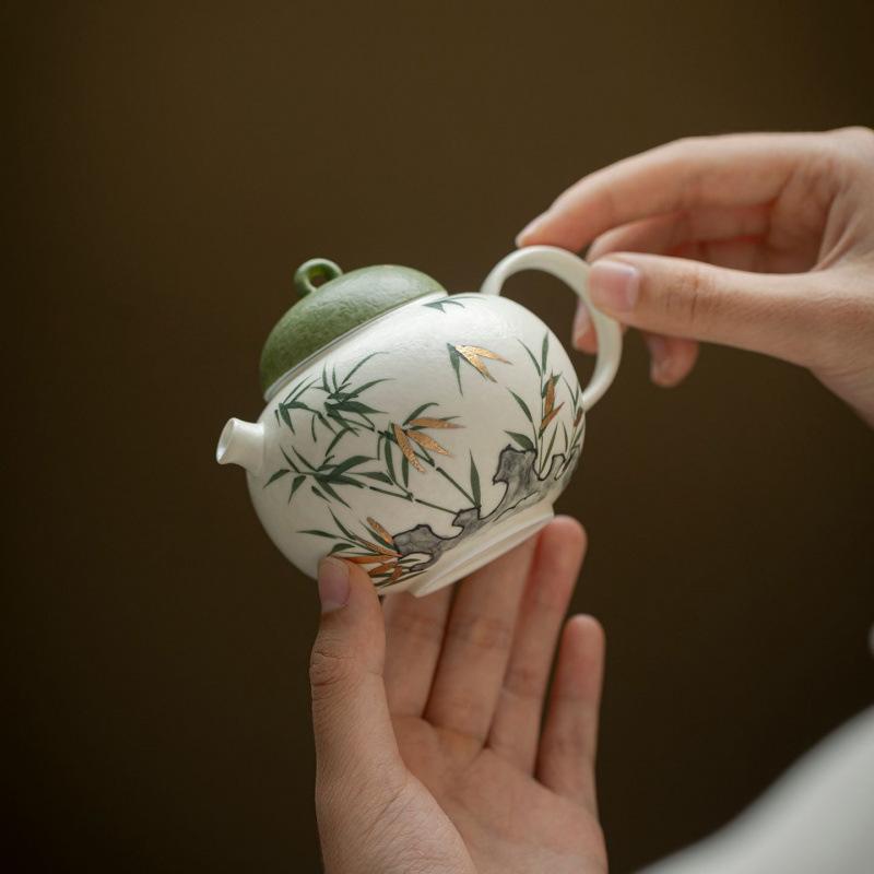 New Chinese hand-painted gold-painted bamboo ceramic teapot ball hole filter household tea anti-scalding hand single pot Kung Fu tea set