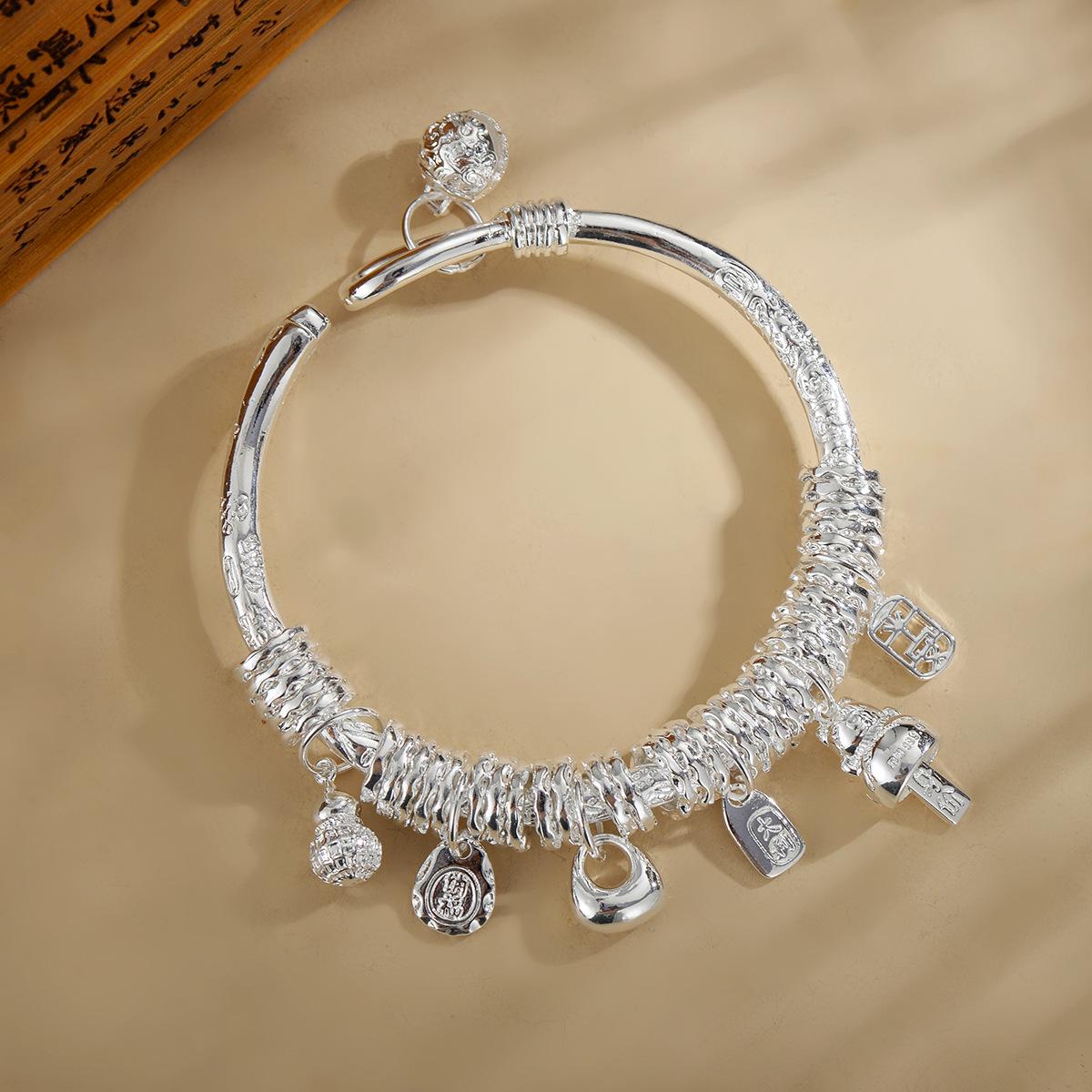 

Exclusively designed lucky charm wrap-around bracelet with gourd bell, lucky cat bangle in thick silver-plated copper, perfect for live streaming.