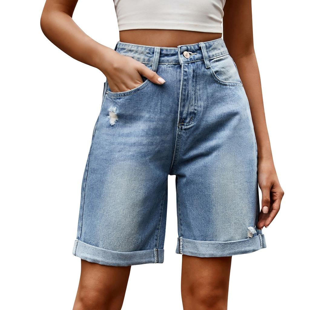 Fasjonable fem-minutters denimshorts med rippede og rullede fritidsbukser for kvinner