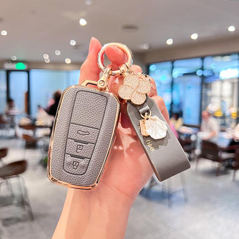 Toyota Key Cover for Camry, RAV4, Corolla, Levin, Avalon: Stylish Shell Buckle for Women.