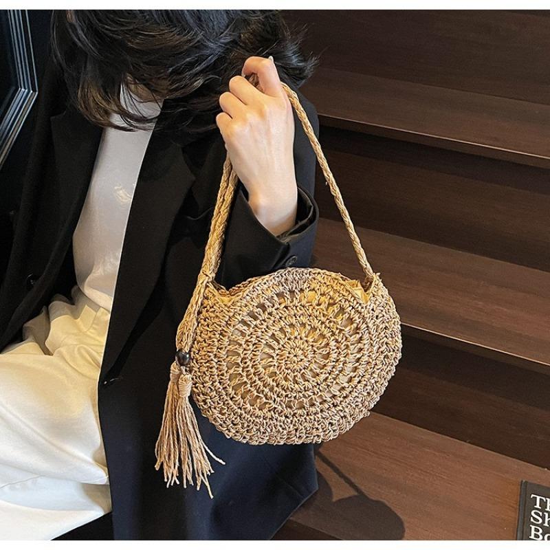 New versatile tassel straw bag shoulder messenger bag handmade hollow woven bag women's bag seaside vacation beach bag