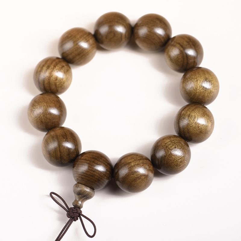 Sichuan Golden Silk Nanmu Ebony Bracelet - Intricate Wenwan Ornament with Perfect Style
