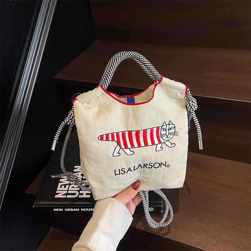 Canvas bag women's summer versatile casual shoulder messenger bag is now popular portable bucket bag