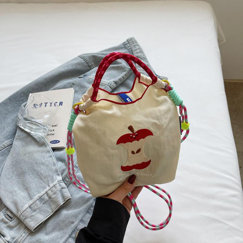 Japanese embroidery cute apple bucket bag girl 2025 new mobile phone bag versatile commuter shoulder messenger bag