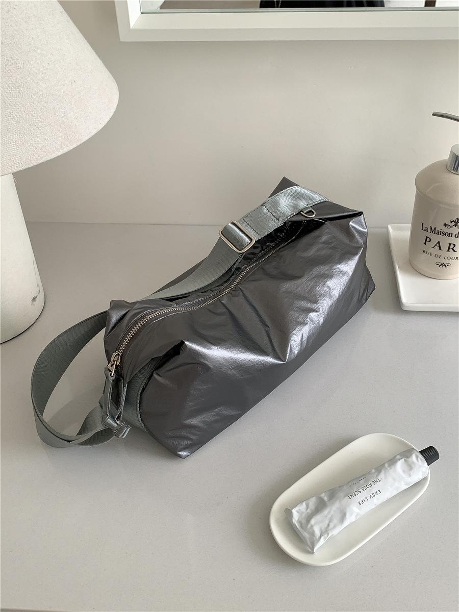 

Commuter dumpling bag women s versatile casual new shoulder bag women s niche fashion brand women s messenger bag women темно-серого