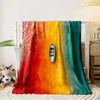 A boat floats atop vibrant red, yellow, and teal water gradients transitioning. for all seasons blanket lunch break throw gift