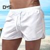 Sommer Low Rise Elastischer Bund Kordelzug Strand Surfen Shorts Atmungsaktive Seite Unregelmäßige Trim Männer Bademode Shorts