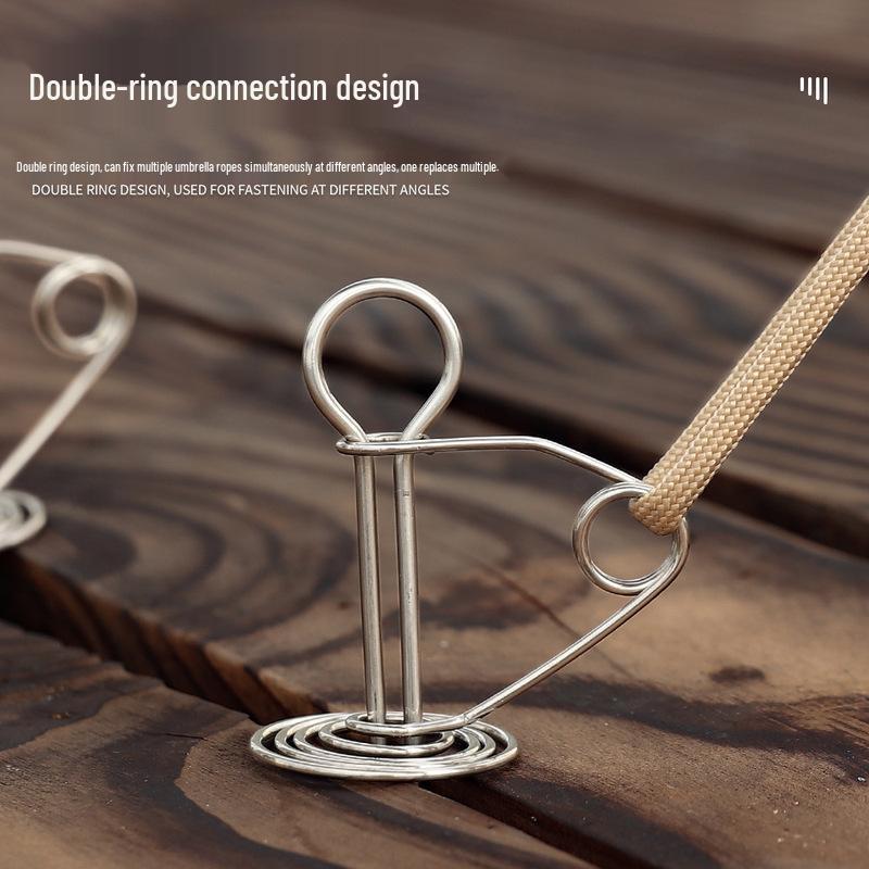 Octopus Deck Nail: High-Strength Stainless Steel Torsion Spring Tent Rope Buckle with Fish Bone Ground Stake.