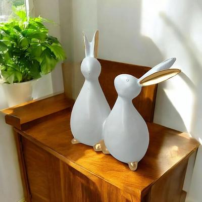 Figura decorativa de poliresina para pareja de conejos, ideal para decorar el hogar, la sala de estar, el dormitorio y la mesa de la oficina. (20,3 cm, margarita blanca)