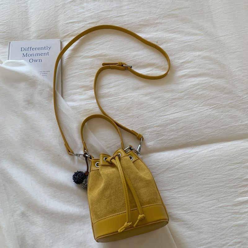 Stylish and simple contrasting color bucket bag women's 2025 autumn new shoulder messenger bag high value casual strap handbag