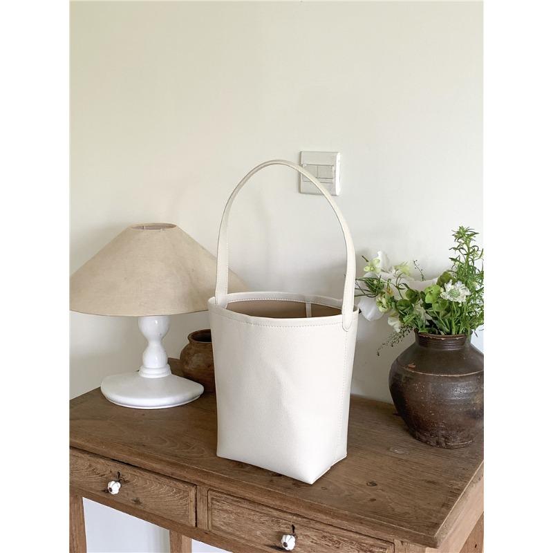 Bucket bag logo shoulder bag large capacity high sense solid color simple leather cylinder mother and child bag