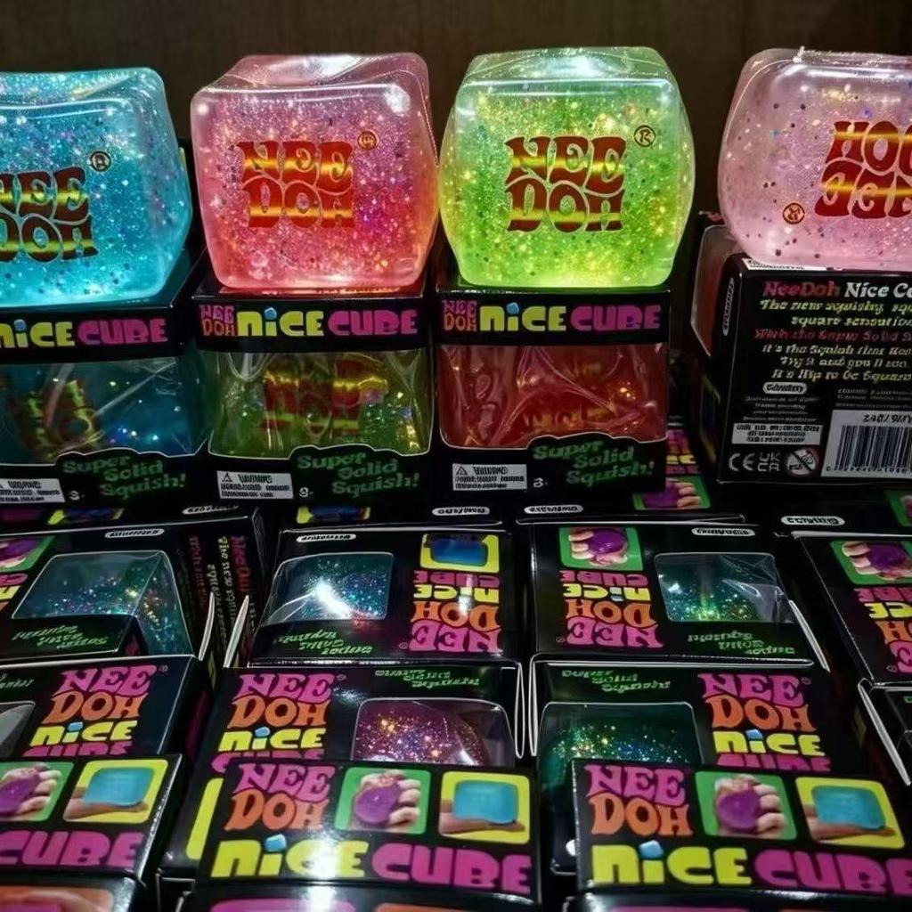 In Stock: Needoh Luminous Glitter Stress Relief Toy - Decompression Ice Cube with Flowing Pattern and Slow Rebound