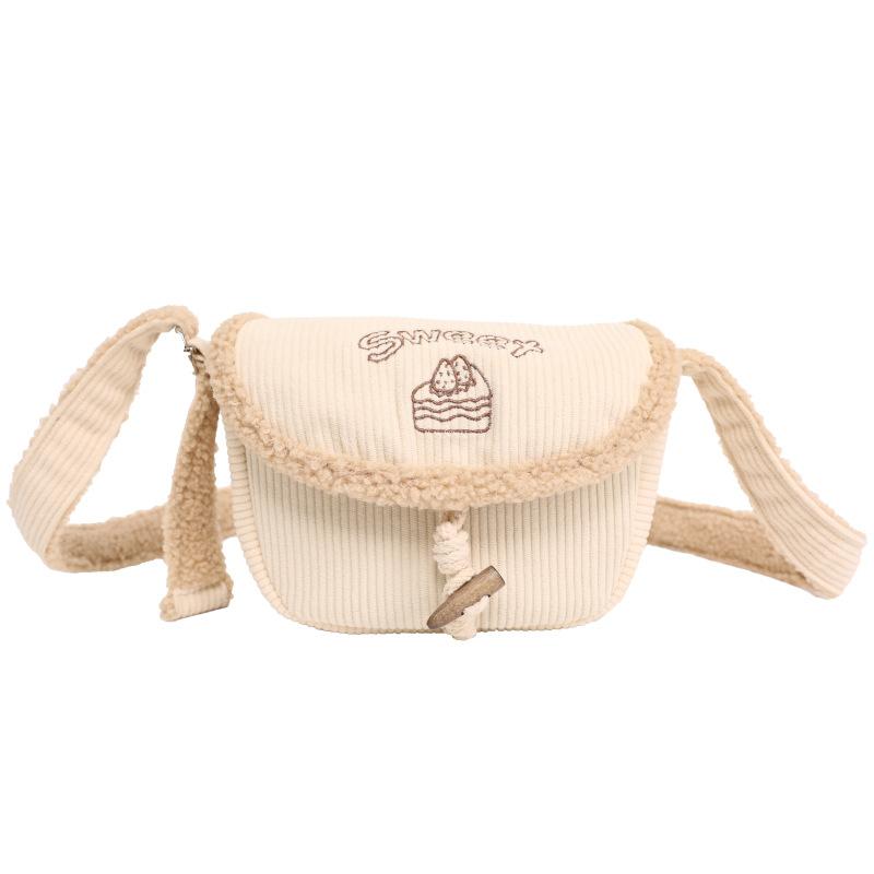 

Korean version of retro corduroy small bag women s 2025 autumn and winter new Korean version simple embroidered saddle bag crossbody bag абрикосовий