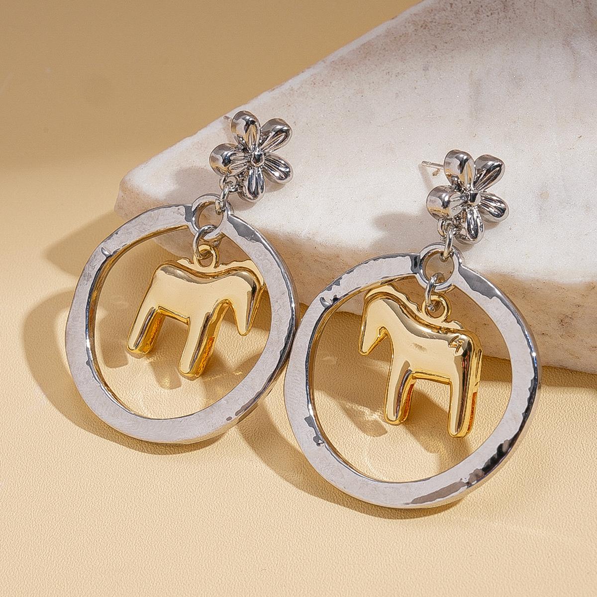Personalized creative metal feeling hollow round flower pony silver needle earrings unique niche earrings