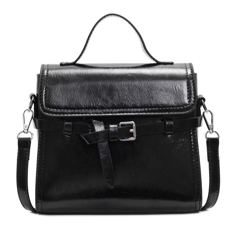 Trend niche high-end sense solid color versatile portable small square bag women's commuting simple oil wax leather messenger bag