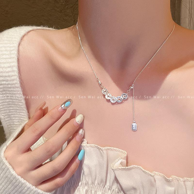 Crushed ice coiled five emperors coin necklace female tassel new Chinese style lucky brand copper coin pendant autumn and winter products