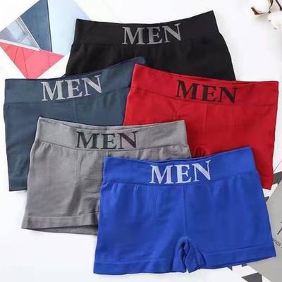 Boxer da uomo Elastico a vita media Tinta unita Senza cuciture Morbido Traspirante U Convesso Asciugatura rapida Assorbimento dell'umidità Cuciture ferme Mutande da uomo Intimo