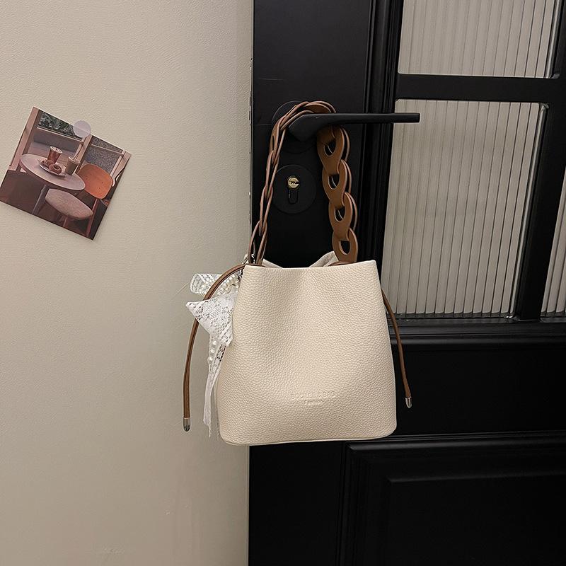 Spring new fashionable versatile solid color bucket bag portable shoulder messenger women's bag