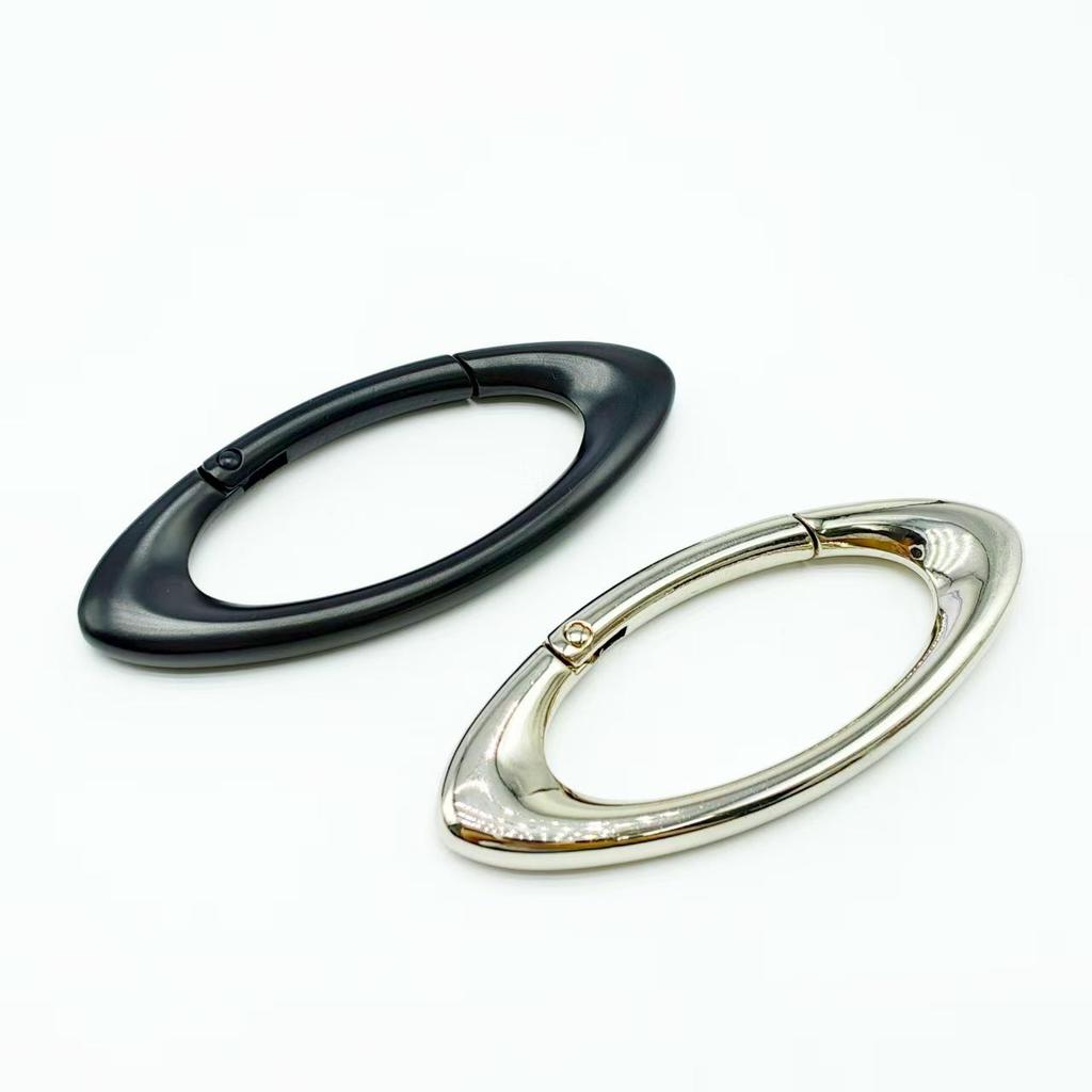 Oval Keychain Bag Pendant with Zinc Alloy Carabiner and Metal Spring Ring Accessory