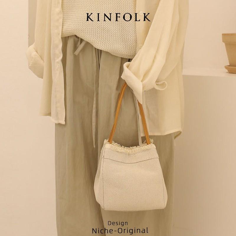 

Deformable Niche High-quality Artistic Denim Stitching Brocade Bag Mini Tassel Bucket Vegetable Basket off білий колір