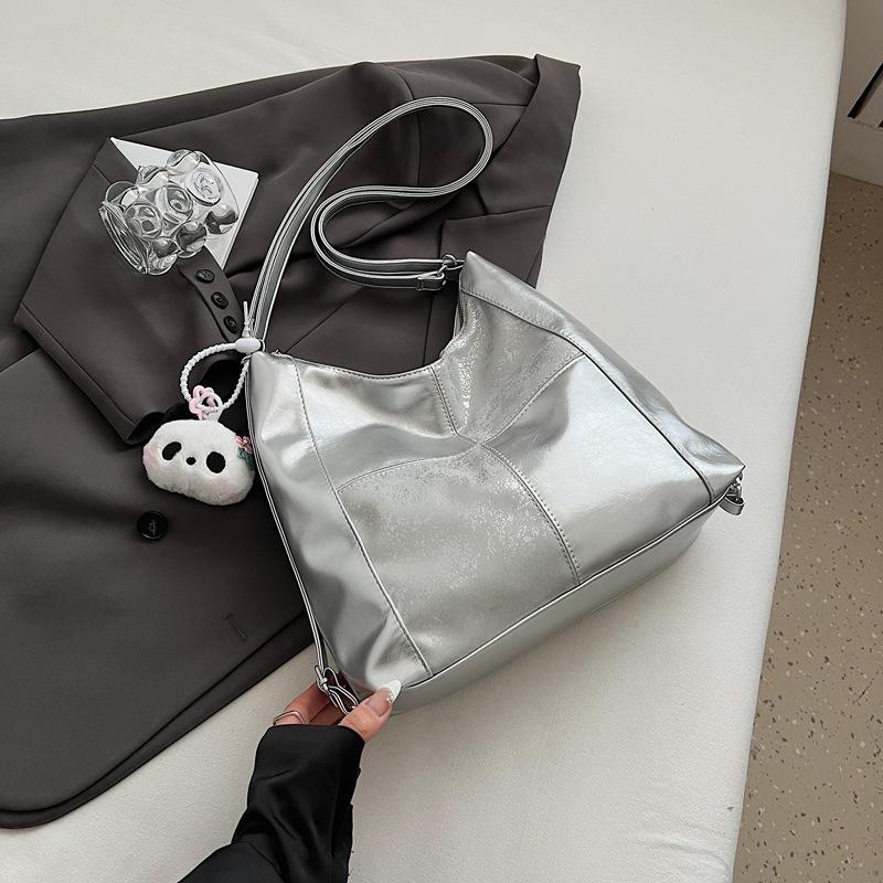 

Large capacity bag women s summer 2025 new fashion splicing multi-back casual shoulder oblique span bag niche tote bag серебряный