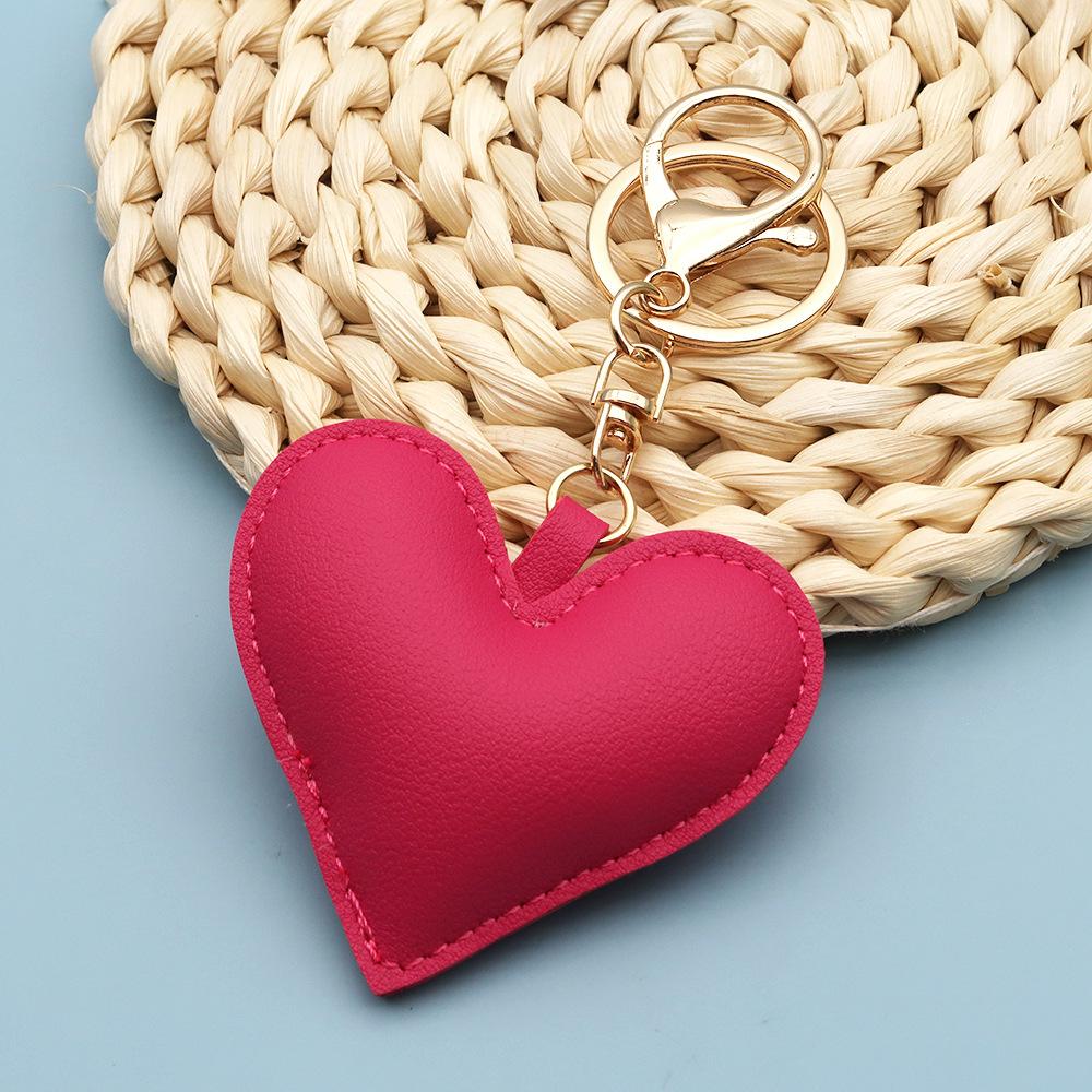 Spot wholesale PU simple peach heart bag pendant Xiaohongshu explosive love couple pendant keychain bag lanyard