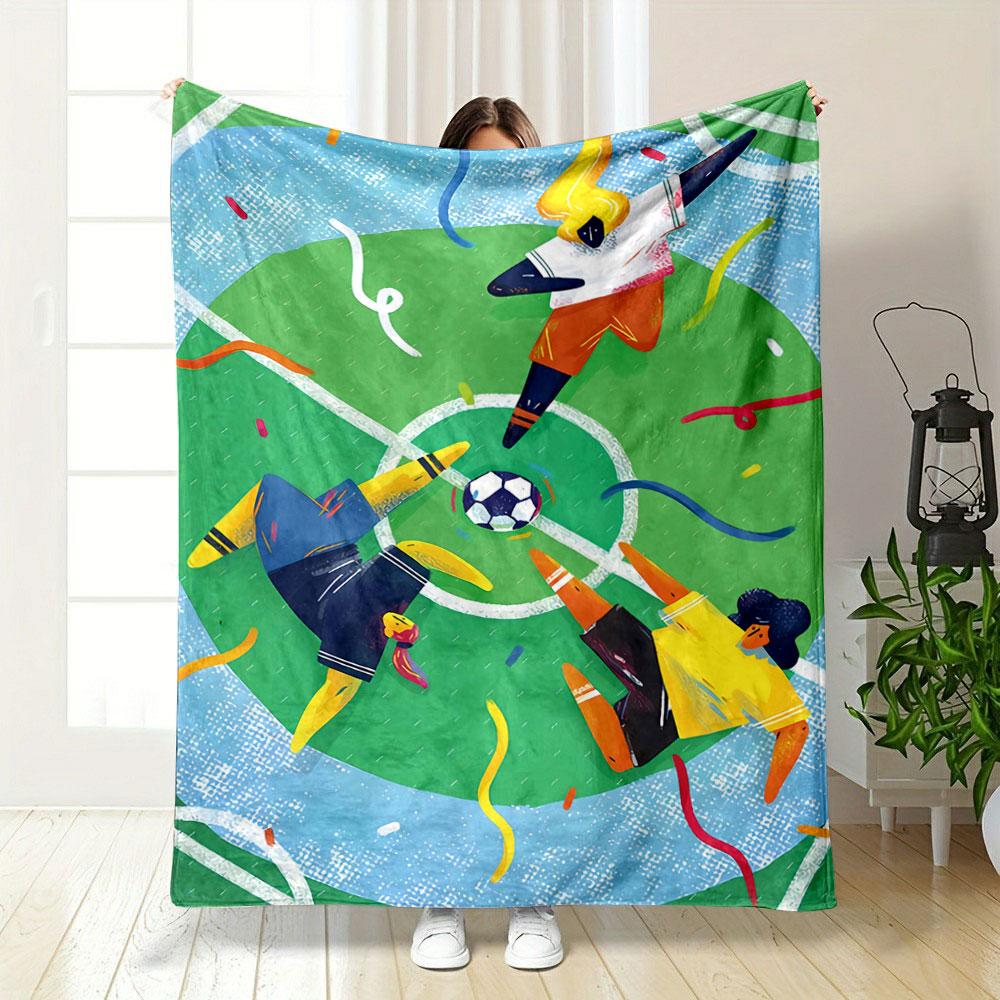 Three abstract figures on a soccer field surround the ball with colorful confetti. for all seasons blanket lunch break throw gift