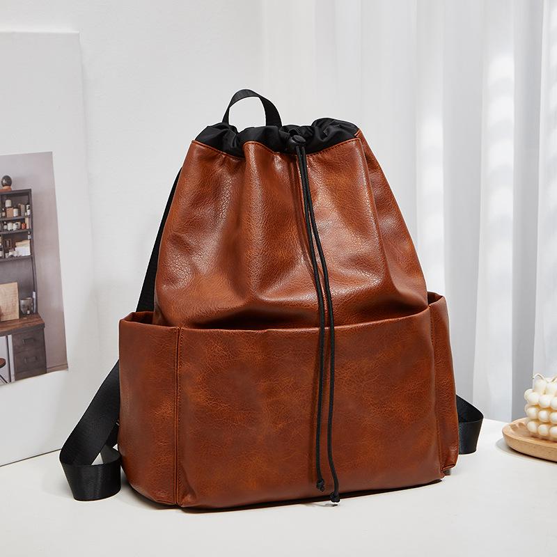 

Large capacity bundle bag backpack fashion backpack casual anti-splashing foldable lightweight travel schoolbag women