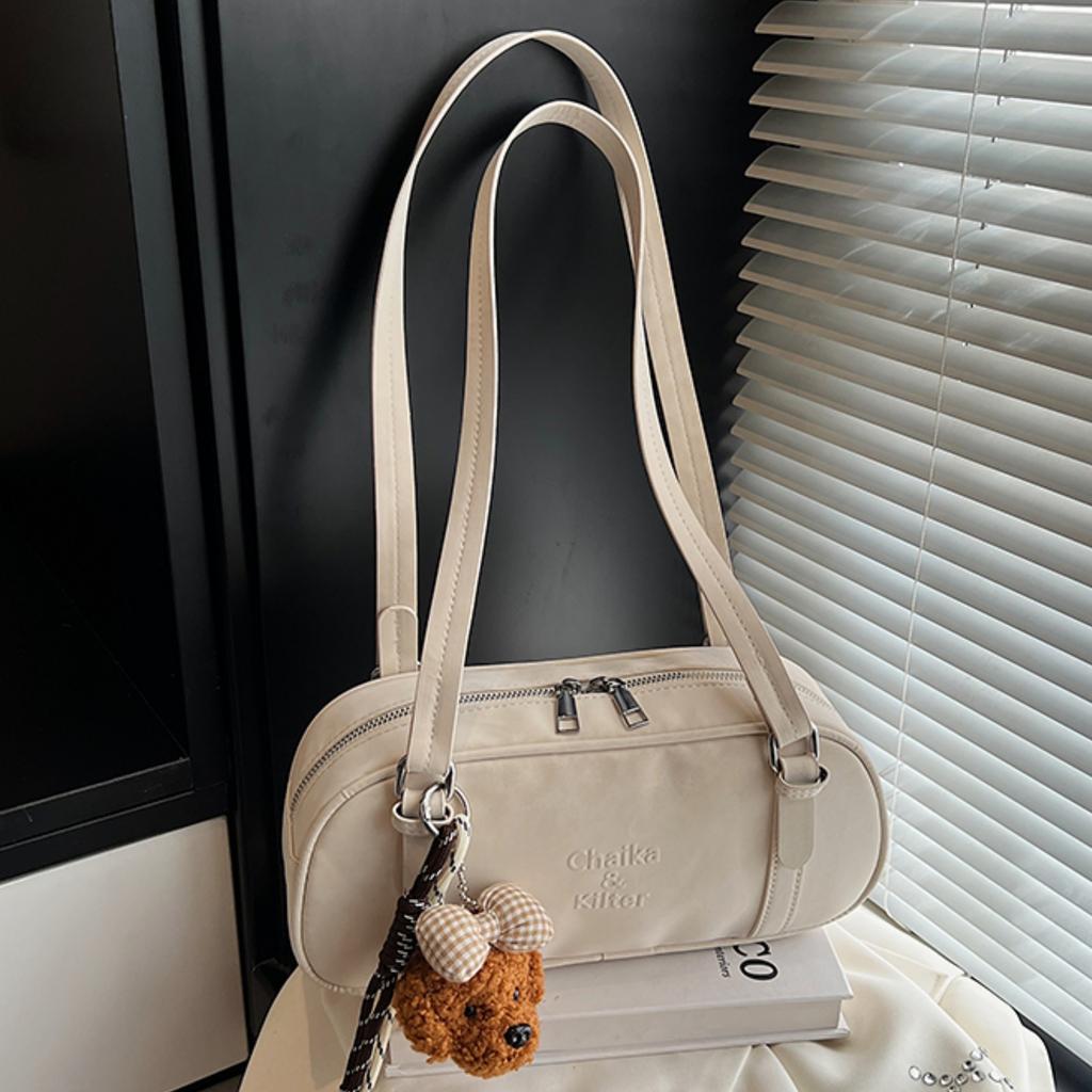 Premium Sense Retro Commuter Armpit Bag Women 2025 New Fashion Casual Portable Shoulder Bag Niche Bowling Bag