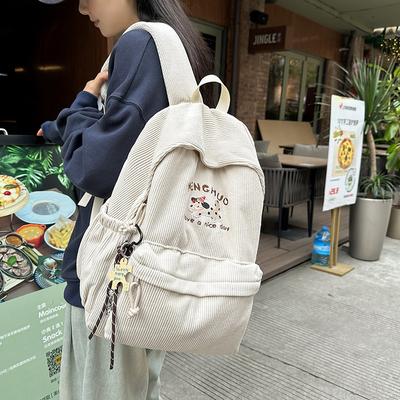Neuer Joker Trend Freizeitrucksack Schultasche Große Kapazität Mittelschüler Cord Schultern.