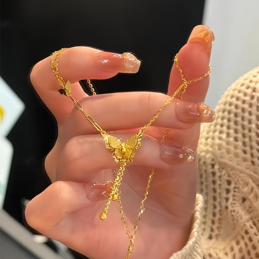 Elegante Quasten-Halskette mit Schmetterling: Glänzendes Luxusdesign für Frauen